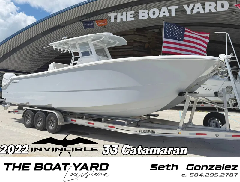 Slide: The Image of 2022 Invincible 33 Catamaran on trailer at The Boat Yard, Louisiana. - 0