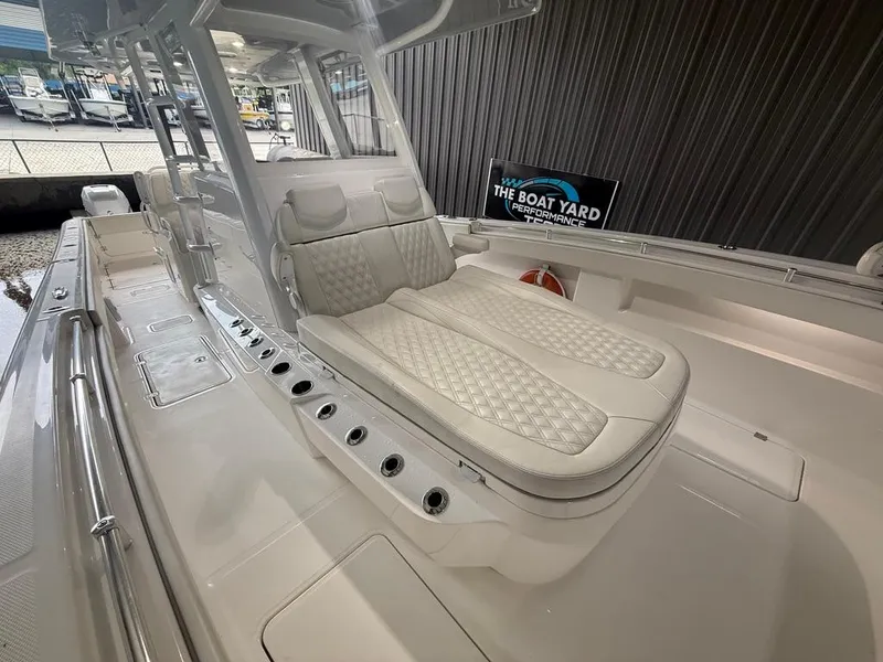 Slide: The Image of 2022 Invincible 33 Catamaran with luxurious seating and sleek design at The Boat Yard. - 33