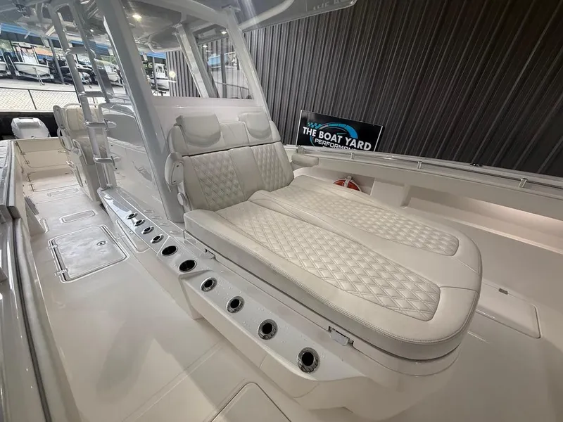 Slide: The Image of 2022 Invincible 33 Catamaran with luxurious seating and modern design at The Boat Yard. - 35