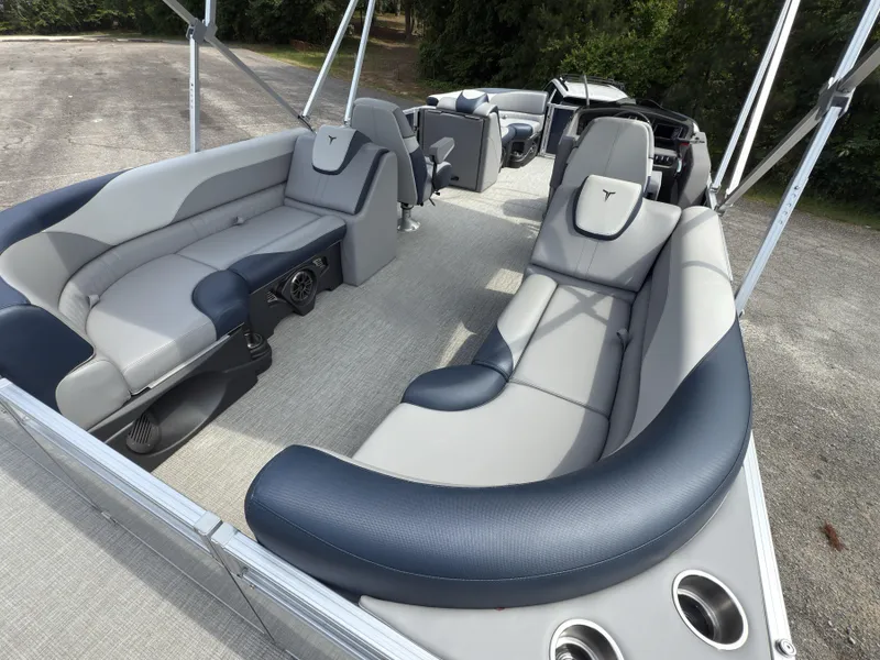 Slide: The Image of 2025 Tahoe LTZ Quad Lounger 23 pontoon boat with luxurious seating and modern design. - 4