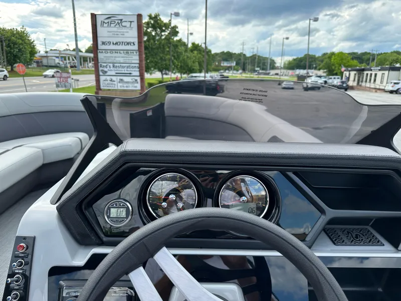 Slide: The Image of Dashboard of a 2025 Viaggio Lago X-S boat with modern controls and gauges. - 12