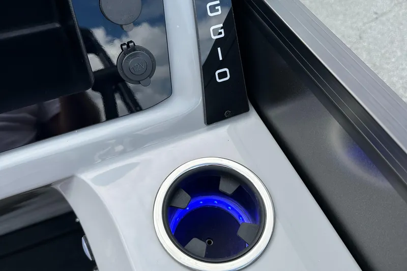 Slide: The Image of 2025 Viaggio Lago X-S dashboard with illuminated cup holder and sleek design. - 19