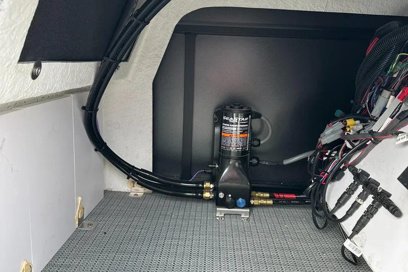 Slide: The Image of 2025 Viaggio Lago X-S interior wiring and components in storage compartment. - 21