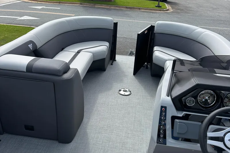 Slide: The Image of 2025 Viaggio Lago X-S boat interior with modern seating and control panel. - 24
