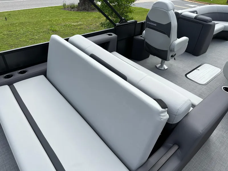 Slide: The Image of 2025 Viaggio Lago X-S boat interior with gray seating and modern design. - 9