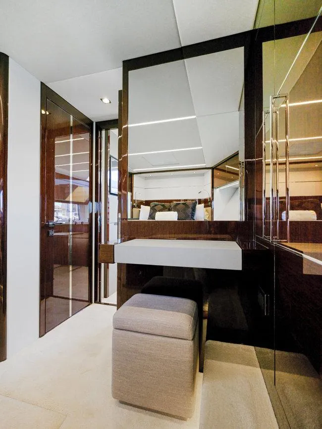 Slide: The Image of Luxurious interior of 2018 Sunseeker Predator 74 yacht with modern vanity and seating. - 24