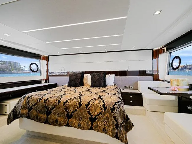 Slide: The Image of Luxurious bedroom interior of 2018 Sunseeker Predator 74 yacht with elegant decor and sea view. - 29