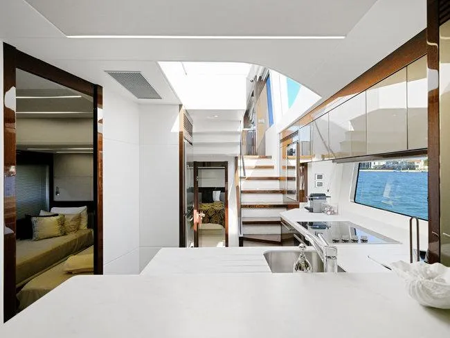 Slide: The Image of Luxurious interior of 2018 Sunseeker Predator 74 yacht with modern kitchen and elegant design. - 15