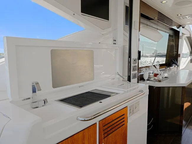 Slide: The Image of Luxurious 2018 Sunseeker Predator 74 yacht interior with modern kitchen amenities. - 45