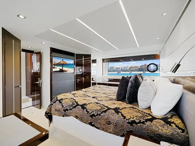 Slide: The Image of Luxurious bedroom interior of 2018 Sunseeker Predator 74 yacht with elegant decor and ocean view. - 34