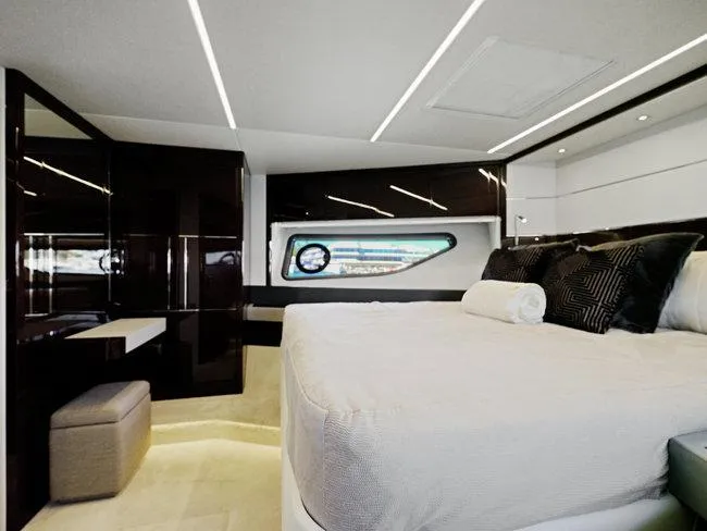 Slide: The Image of Luxurious bedroom interior of 2018 Sunseeker Predator 74 yacht with modern design elements. - 21