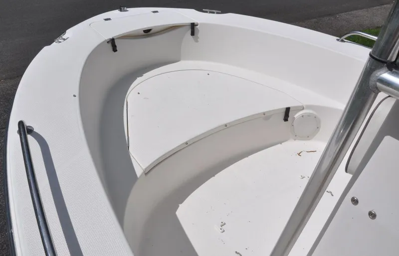 Slide: The Image of 2003 Trophy 1903 Center Console boat, white deck with seating area, clean and spacious design. - 14