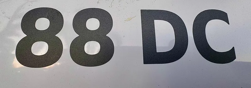 Slide: The Image of Yamarin 88 DC 2023 model logo on boat exterior. - 35
