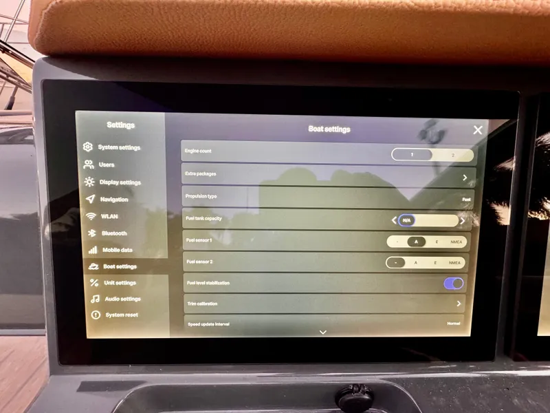 Slide: The Image of Touchscreen display showing settings menu on a 2023 Yamarin 88 DC boat. - 44