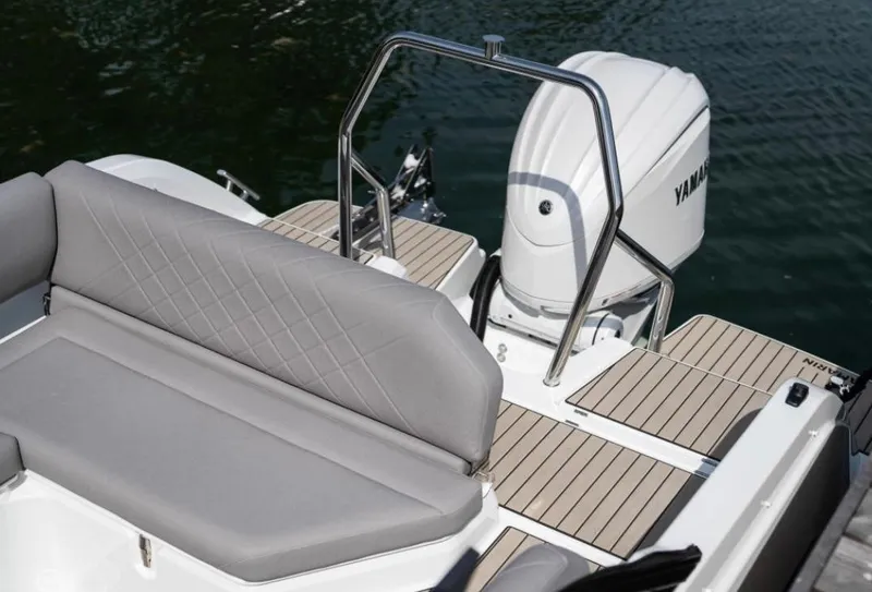 Slide: The Image of 2025 Yamarin 80DC boat with Yamaha engine, featuring sleek seating and deck design. - 19