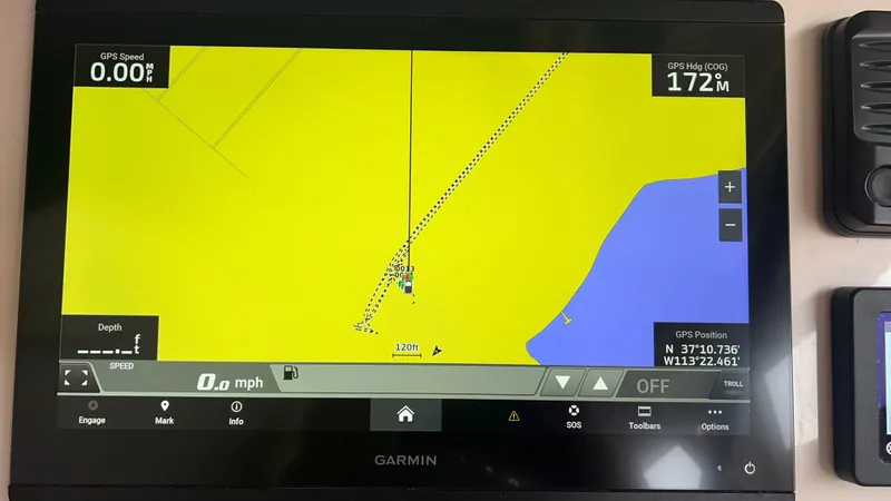 Slide: The Image of Garmin GPS map on Grady-White Freedom 275 boat, 2021 model. - 34