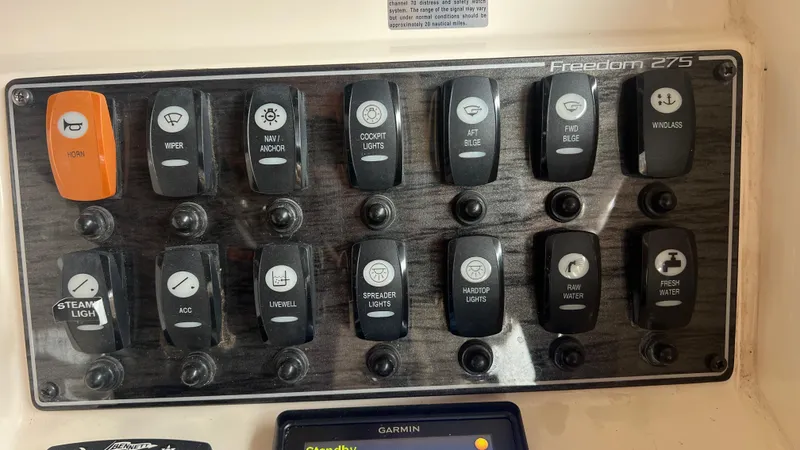 Slide: The Image of Control panel of Grady-White Freedom 275 boat, 2021 model. - 37