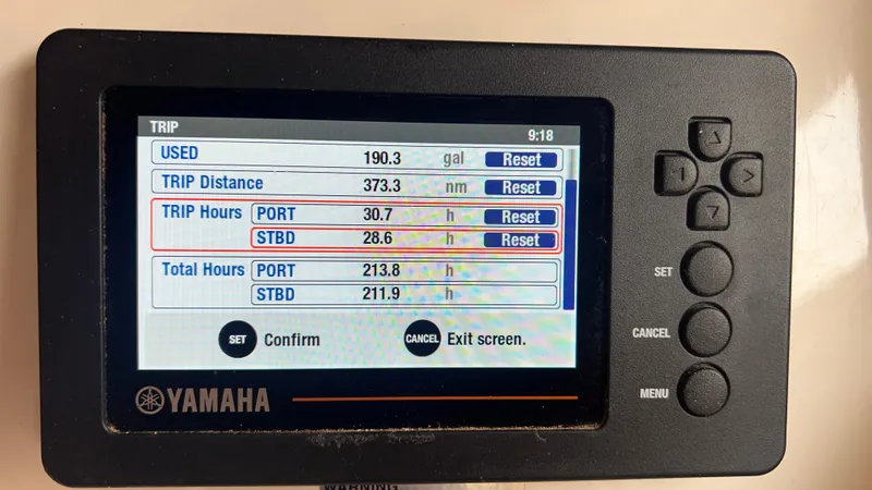 Slide: The Image of Yamaha display on 2021 Grady-White Freedom 275 showing fuel and trip data. - 40