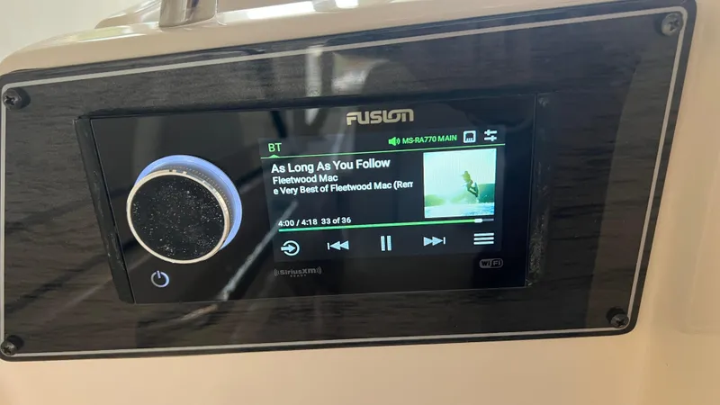 Slide: The Image of Fusion stereo on Grady-White Freedom 275, playing Fleetwood Mac. - 42