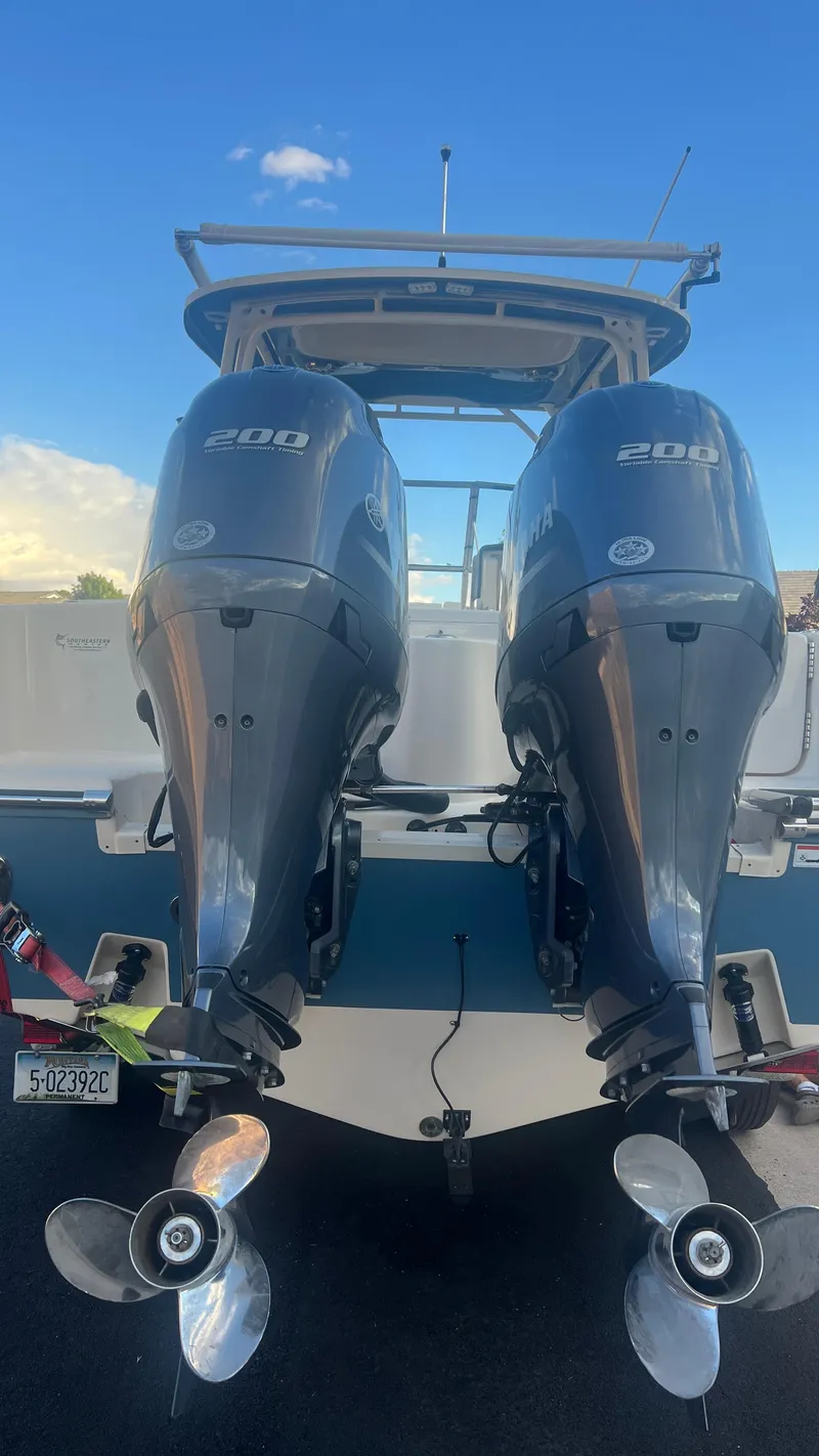 Slide: The Image of Grady-White Freedom 275 boat with dual outboard engines, year 2021. - 6