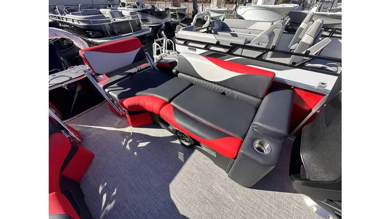 Slide: The Image of 2025 Tahoe Pontoon LTZ Quad Lounger Shift with stylish red and black seating. - 3