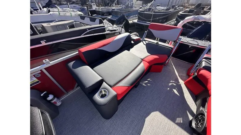 Slide: The Image of 2025 Tahoe Pontoon LTZ Quad Lounger Shift with stylish red and black seating. - 4