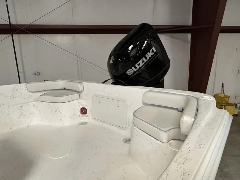 Slide: The Image of 2024 ALK2 Powerboats 22 CRS with Suzuki outboard motor, featuring white interior seating. - 5