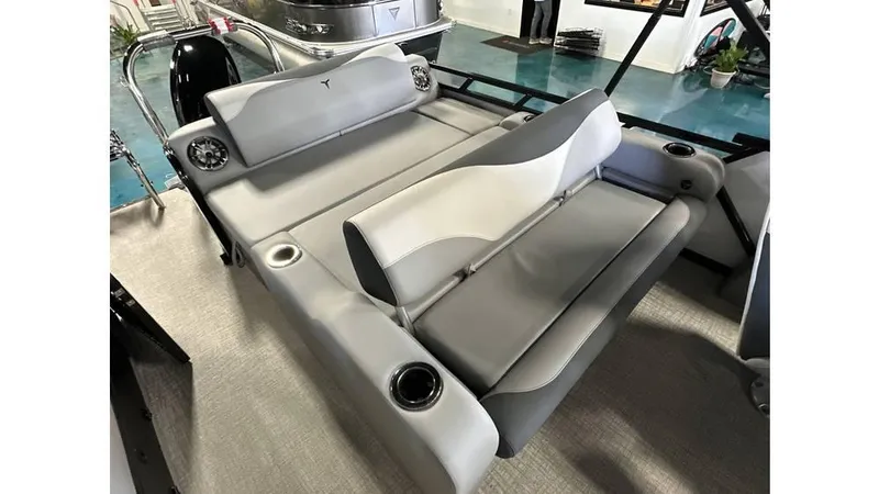 Slide: The Image of 2025 Tahoe Pontoon LTZ Versatile Rear Lounger with gray seating and cup holders. - 4