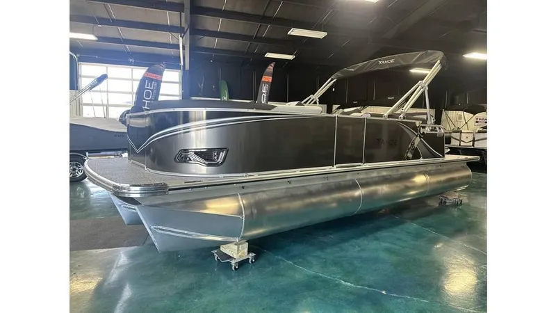 The Image of 2025 Tahoe Pontoon LTZ Cruise Rear Bench in showroom, sleek design, modern features. - 0