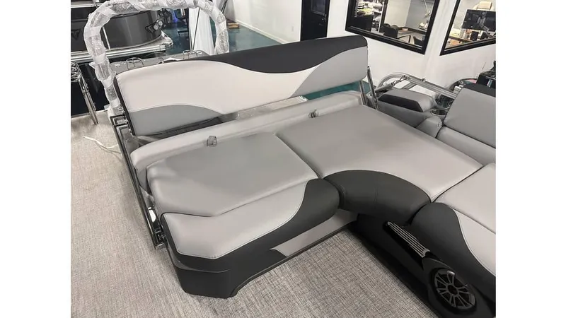 Slide: The Image of 2025 Tahoe Pontoon LTZ Cruise Rear Bench with sleek gray and black seating design. - 5