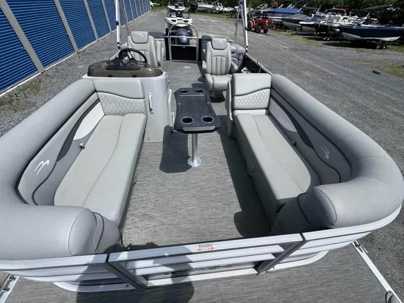 Slide: The Image of 2022 Bennington 22 SSR pontoon boat with spacious seating and modern design. - 13