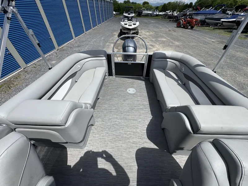 Slide: The Image of 2022 Bennington 22 SSR pontoon boat with spacious seating and modern design. - 16