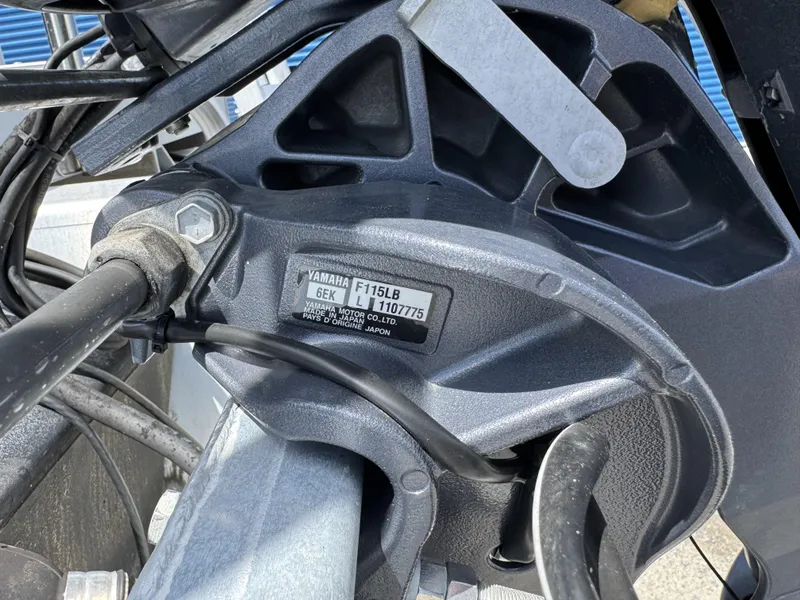 Slide: The Image of Close-up of Yamaha F115LB engine part on 2022 Bennington 22 SSR boat. - 22