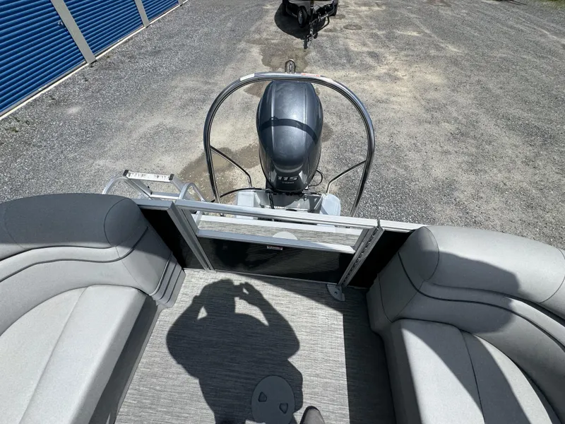 Slide: The Image of 2022 Bennington 22 SSR pontoon boat with outboard motor, viewed from above. - 5
