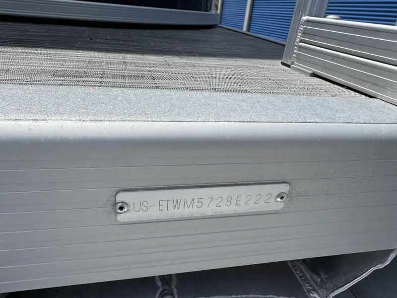 Slide: The Image of 2022 Bennington 22 SSR boat with visible hull identification number plate. - 7