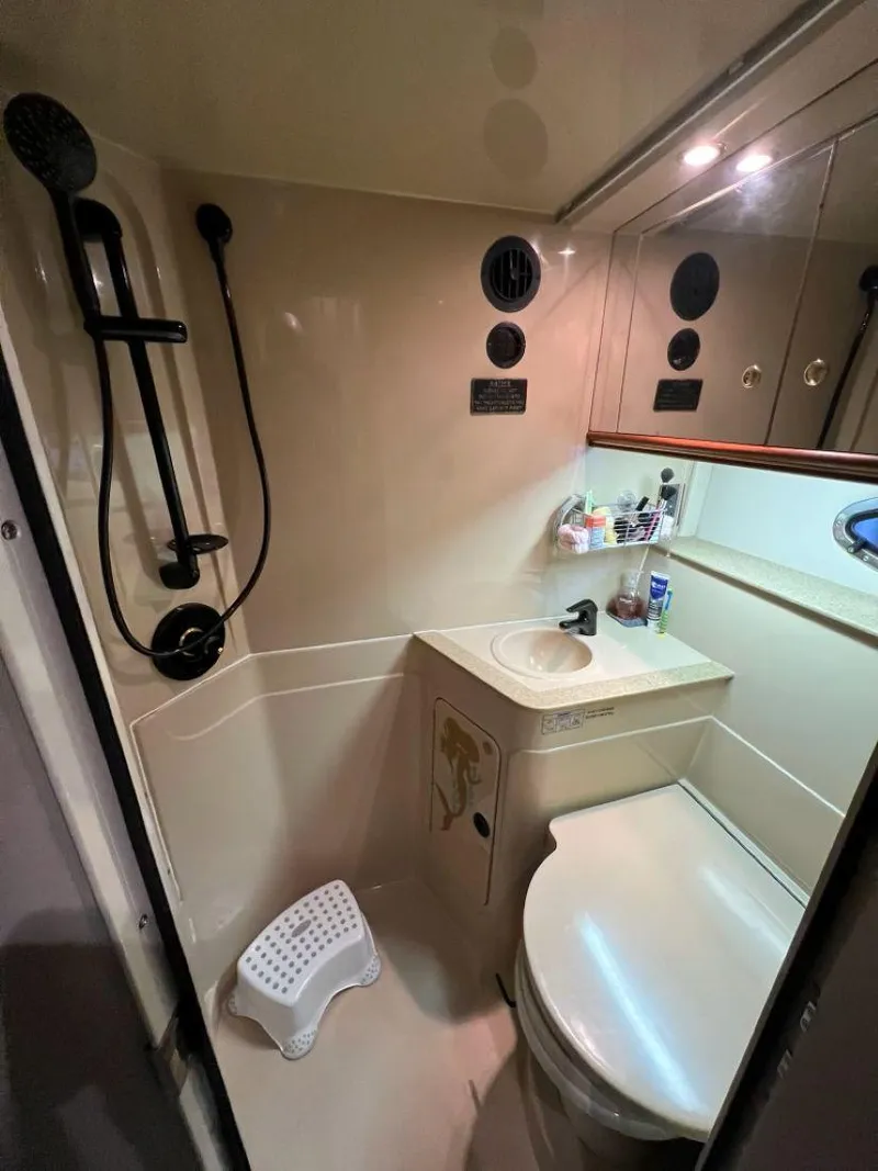 Slide: The Image of Bathroom interior of 2000 Cruisers Yachts 4270 Express with shower and sink. - 33
