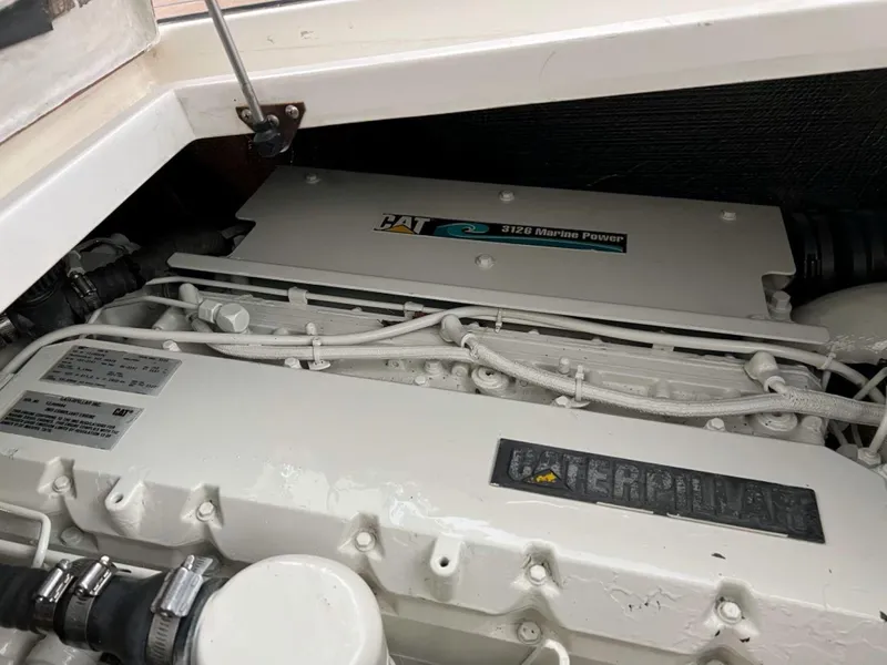 Slide: The Image of Engine compartment of 2000 Cruisers Yachts 4270 Express with CAT marine power. - 42