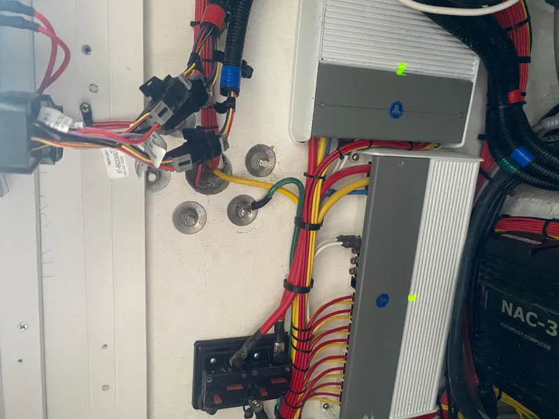 Slide: The Image of Wiring and components inside a 2022 Front Runner 36 cc boat. - 24