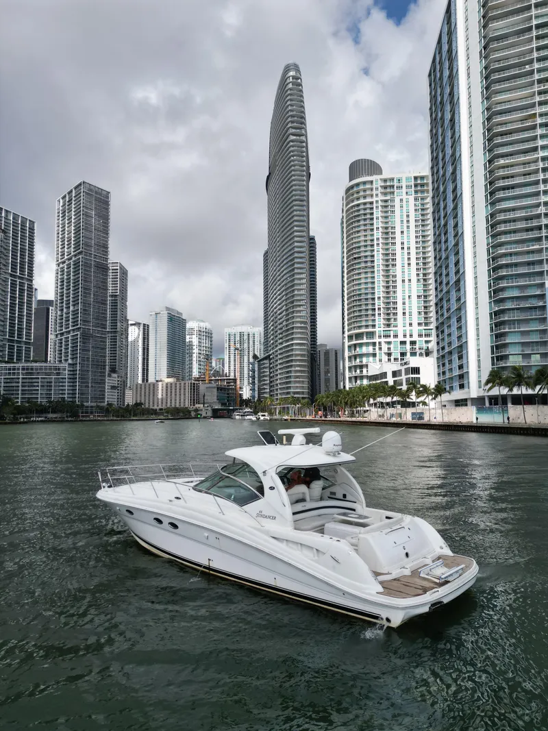 Slide: The Image of Sea Ray 44 Sundancer yacht cruising in urban waterfront, 2005 model. - 37
