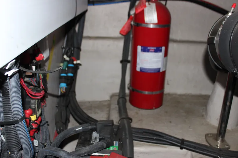 Slide: The Image of Engine room of 2017 Sea Ray Sundancer 400 with fire extinguisher and wiring. - 10
