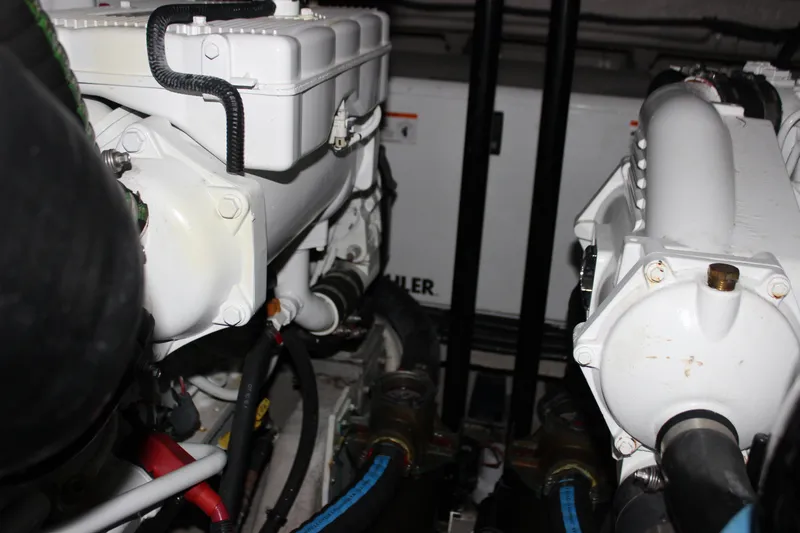 Slide: The Image of Engine room of a 2017 Sea Ray Sundancer 400 yacht, showcasing mechanical components. - 16