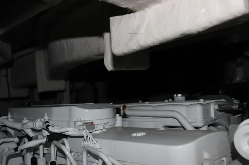 Slide: The Image of Engine compartment of 2017 Sea Ray Sundancer 400 yacht, showcasing mechanical components. - 17