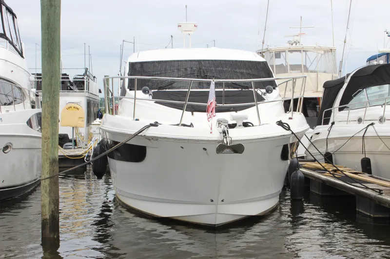 Slide: The Image of 2017 Sea Ray Sundancer 400 yacht docked at marina, front view. - 23