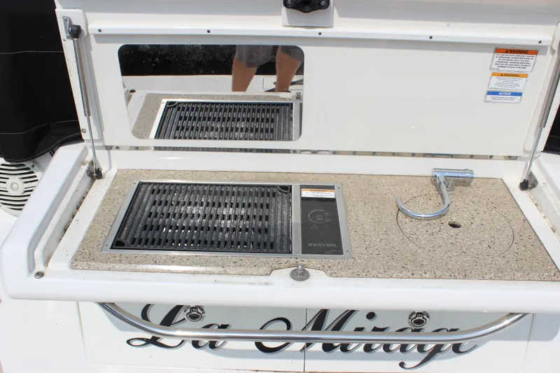Slide: The Image of Outdoor kitchen on 2017 Sea Ray Sundancer 400 yacht with grill and sink. - 28