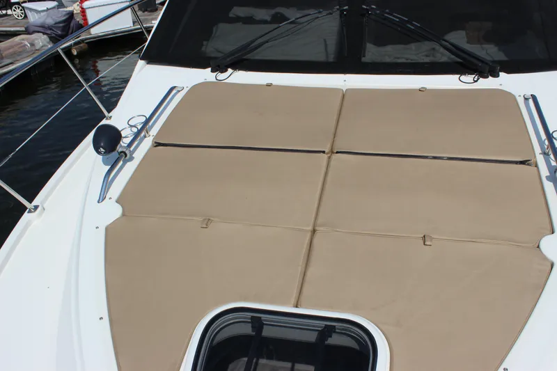 Slide: The Image of 2017 Sea Ray Sundancer 400 yacht with beige sun pads on deck. - 30