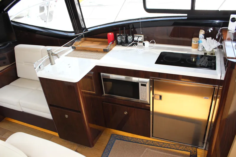Slide: The Image of Luxurious 2017 Sea Ray Sundancer 400 yacht kitchen with modern appliances and sleek design. - 40
