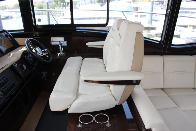 Slide: The Image of Luxurious interior of 2017 Sea Ray Sundancer 400 yacht with plush seating and modern helm. - 41