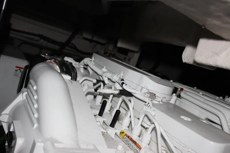 Slide: The Image of Engine compartment of 2017 Sea Ray Sundancer 400 yacht, showcasing mechanical components. - 9