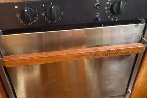 Slide: The Image of Stainless steel oven with wooden handle, Hunter 340 model, 2001. - 18