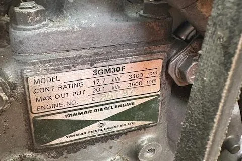 Slide: The Image of Yanmar 3GM30F diesel engine label, showing specifications and ratings. - 24